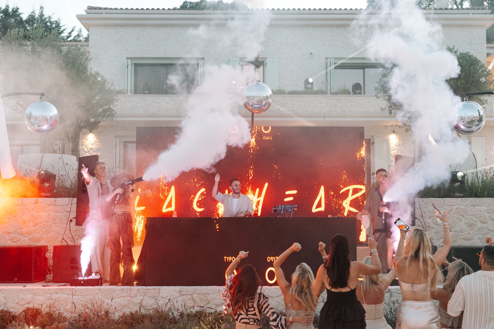 [blackheart] live — stage wall in flames, crowd front row
